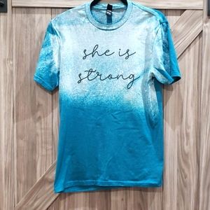 "She Is Strong" graphic tee